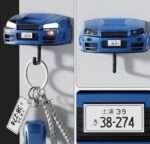 Blue R34-style sports car wall key holder, front view with keys hanging