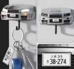 Silver R34-style sports car wall key holder, front view with keys hanging