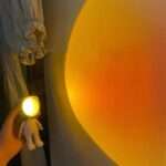 Robot Sunset Projection Lamp held in hand
